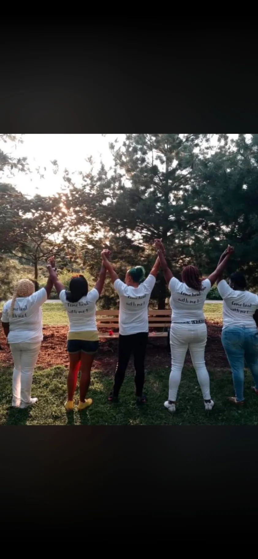 Come Heal With Me participants standing together outdoors