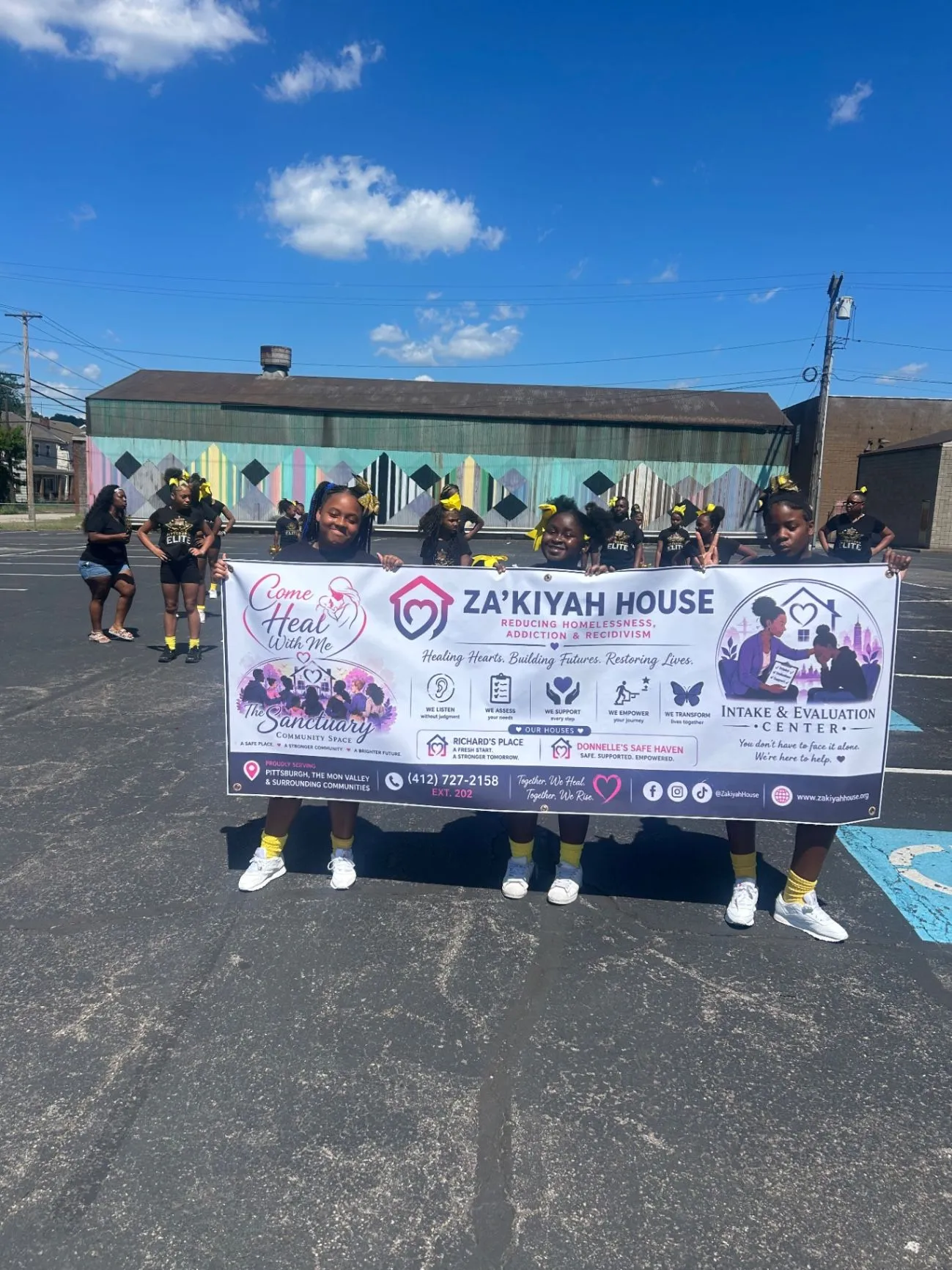 Za'kiyah House community members gathered outside The Sanctuary