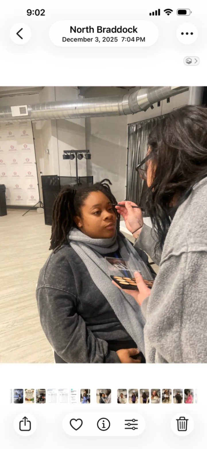 A community member receiving makeup support at The Sanctuary
